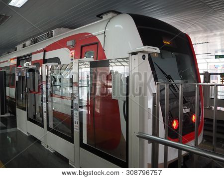 Jakarta, Indonesia - June 17, 2019: An Lrt Jakarta Train Arrives At Velodrome Lrt Station.