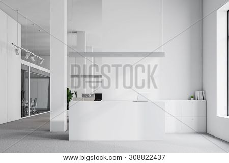 White Reception Desk In Office Interior