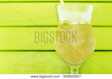 Cocktail With Liquid Nitrogen. Summer Cooling Cocktail In A Glass Glass With A Straw. From Liquid Ni