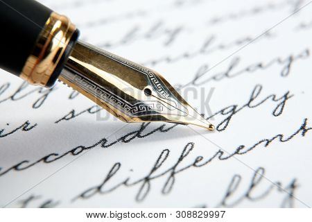 Fountain Pen On Paper With Ink Text Closeup