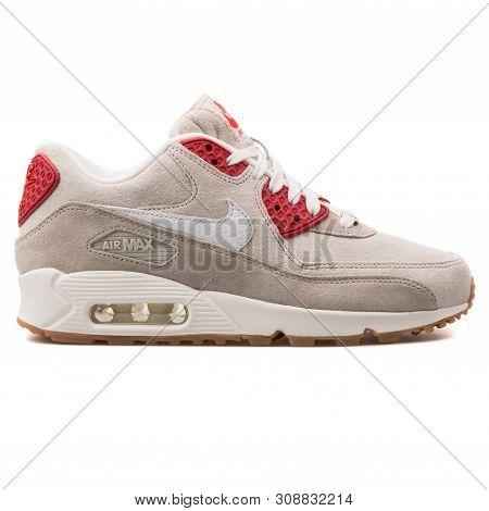 Vienna, Austria - August 25, 2017: Nike Air Max 90 Qs Beige And Red Sneaker On White Background.
