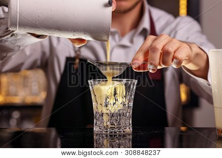 Barmen Is Making Batida Cocktail Drink With Mint Making By Bartender