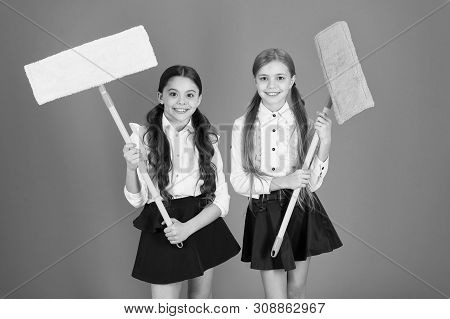 Super Duper Cleaning. Cute Schoolgirls Holding Floor Mops. School Children With Cleaning Tools. Litt