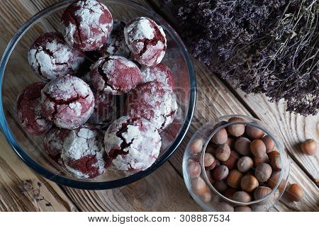 Food Composition On A Wooden Background Of Natural Color, With Dried Flowers, Homemade Cookies Of Re