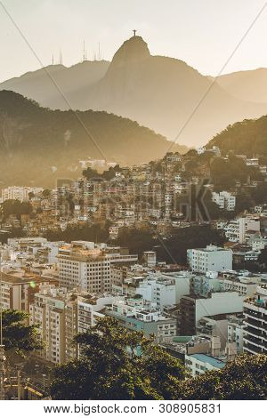 Sunset View In Copacabana, Apartment Buildings, Favela Babilonia, Mountains, And Corcovado
