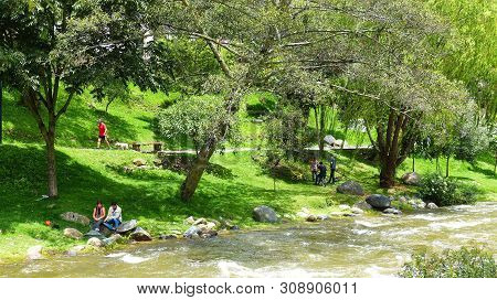 Cuenca, Ecuador - February 10, 2019: View Of The River Tomebamba And Public Park Along The River Tha