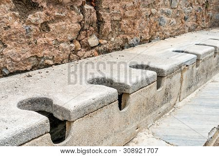 Public Multi Seat Toilet Marble Stone And Rock At Spectacular Antique Ruins In Ephesus At Selcuk Izm