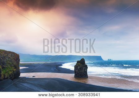 Beautiful Sunset At Reynisfjara Beach In Southern Iceland. Icelandic Landscapes, Famous Travel Desti