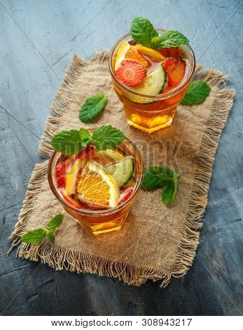 Refreshing Pimms Cocktail With Fruit And Vegetables.