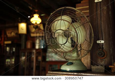 Asian Antique Fan Displayed In Retro Atmosphere