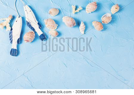 Coastal Living Or Vacation By The Sea Theme Decorations  On Blue Textured Background.  Selective Foc