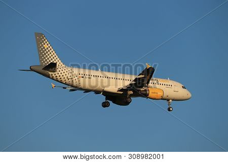 Amsterdam, The Netherlands - June, 29th 2019: Ec-mby Vueling Airbus A320-200 Final Approaching To Po