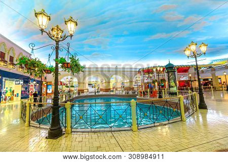 Doha, Qatar - February 21, 2019: Vintage Lamps And Venice Canal In Villaggio Mall, A Shopping Center