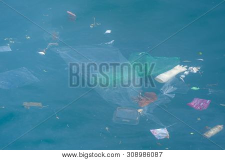 Trash, Plastic, Garbage, Bottle... Environmental Pollution On The Beach. Royalty High-quality Free S