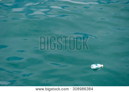 Trash, Plastic, Garbage, Bottle... Environmental Pollution On The Beach. Royalty High-quality Free S