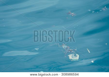 Trash, Plastic, Garbage, Bottle... Environmental Pollution On The Beach. Royalty High-quality Free S