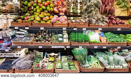Latvia, Riga, February, 13, 2021 - Shelves With Various Of Fresh Organic Grennery And Vegetables In 