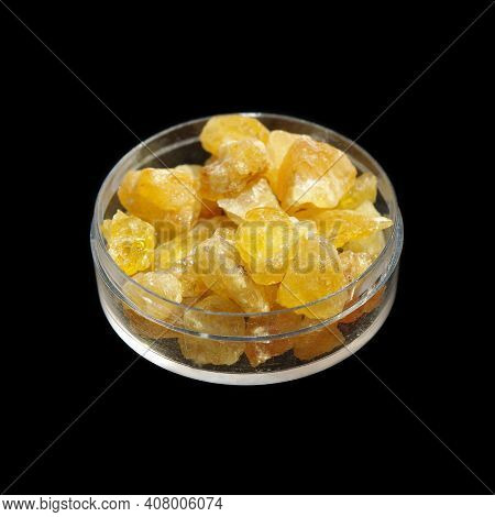 Natural Crude Heliodor Crystals On Black Background