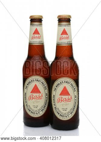 IRVINE, CA - MAY 25, 2014: Two bottles of Bass Ale with condensation. The Bass Brewery was founded in 1777 by William Bass, in Trent, England is now owned by Anheuser-Busch InBev.