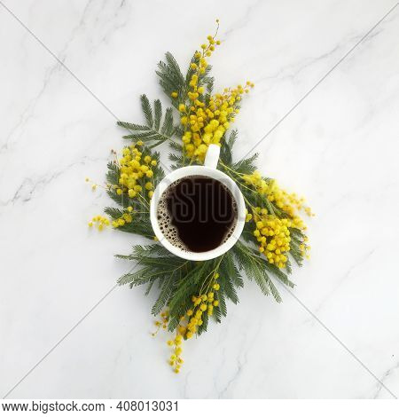Cup Of White Coffee With Yeallow Mimosa Flowers. Flat Lay, Top View.