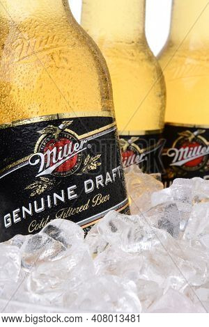 IRVINE, CA - MAY 30, 2014: Closeup of Miller Genuine Draft bottles in ice. MGD is actually made from the same recipe as Miller High Life except it is cold filtered.