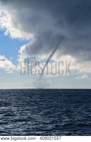 Portrait View Of Water Spout On The Ocean