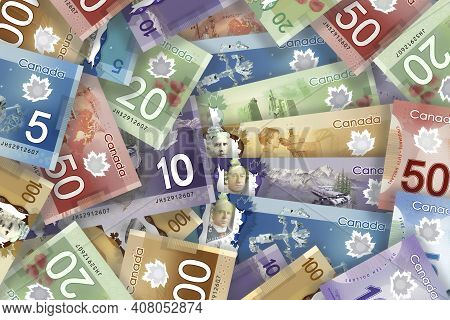 Calgary, Alberta, Canada. Feb 11, 2021. A Collage Of Canadian Bills Of Different Currency.