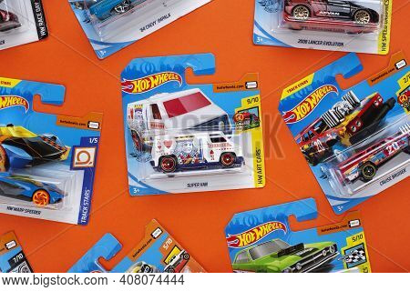 Ukraine, Kyiv - February 28. 2020: The Group Of Colorful Toy Car Collection On Orange Background. Ho