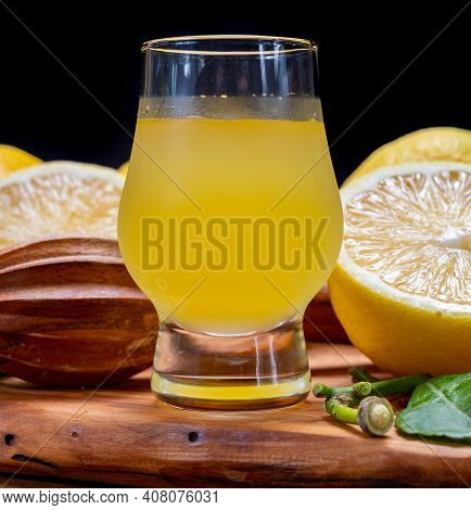 Ice Cold Sweet Limoncello Liqueur Made From New Harvest Of Fresh Ripe Yellow Italian Lemons, Amalfi