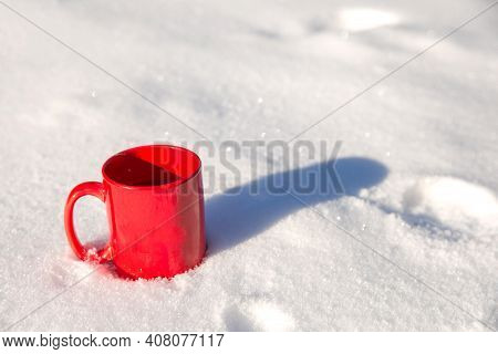 Steaming Cup Of Hot Coffee, Tea Or Chocolatemilk In The Cold Fresh White Snow, Winter, Cozy, Drink, 