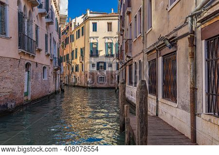 Venice, Italy - September 23, 2019: Venice Canal And Traditional Colorful Venetian Houses View. Clas