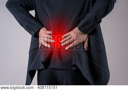 Back Pain, Kidney Inflammation, Office Worker Diseases On Gray Background