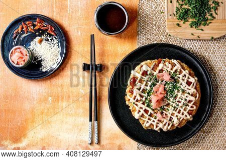 Homemade Japanese Fast Food Okonomiyaki Cabbage Pancake Decorated By Spring Onion, Pickled Ginger, M