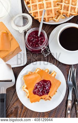 Homemade Waffles With Norwegian Brown Cheese And Lingon Jam, On A Wooden Background, Vertical, Top V