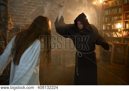 Exorcist casting out satan from crazy woman