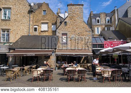 Saint-brieuc, France - August 27, 2019: Residents Of The City And Tourists Relax In Cafe And On Terr
