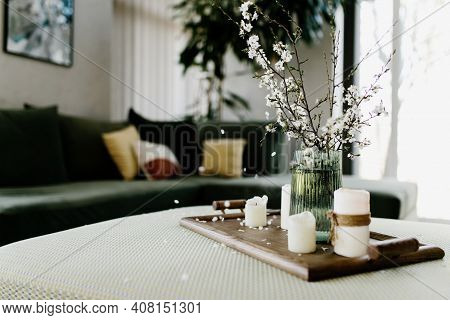 Home Interior. Relaxing Candles. Apple Tree Color Has Flown. Blurred Background. High Quality Photo