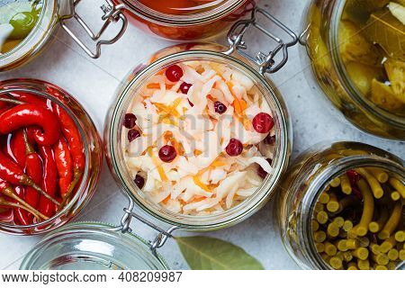 Homemade Pickled Or Fermented Vegetables - Sauerkraut, Wild Garlic, Chili, Pickles, Pickled Tomatoes