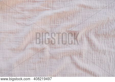 Muslin Cloth Texture Background In Neutral Tones. Muslin Cotton Fabric Of Plain Weave. Muslin Is A S