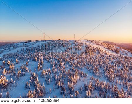 Colorful Winter Sunset In Sheregesh Ski Resort Mountains Covered Trees. Aerial Top View Beautiful Fo