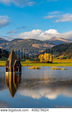 autumn pond under the mountains, Murau district,
Styria, Austria