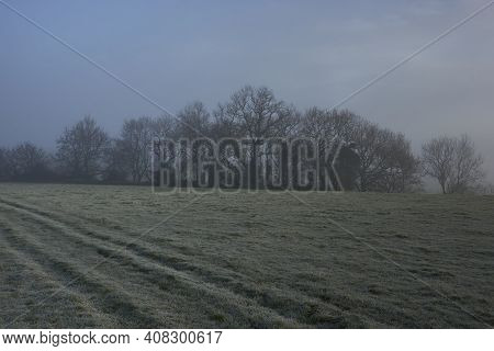 Winter Mist And Frost In The Woolley Valley, An Area Of Outstanding Natural Beauty In The Cotswolds 