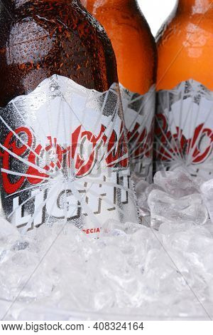IRVINE, CA - MAY 30, 2014: Closeup of Coors Light bottles in ice. Coors operates a brewery in Golden, Colorado, that is the largest single brewery facility in the world.