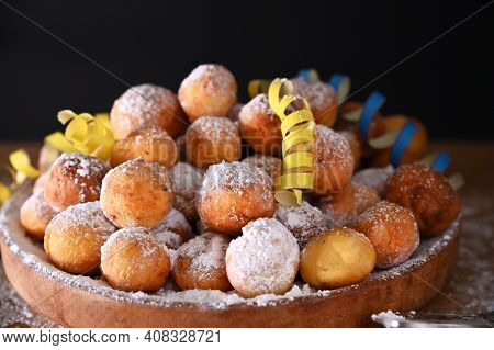 Falling Confetti On Buns In Powdered Sugar. Traditional Venetian Carnival And Food Typical. Coffee, 
