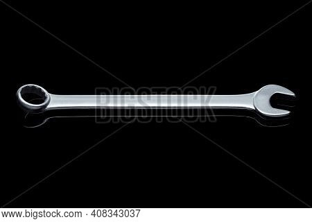 Spanner Wrench Iron Hand Tool For Repair And Service Plumbing Instrument Isolated On Black Glass Bac