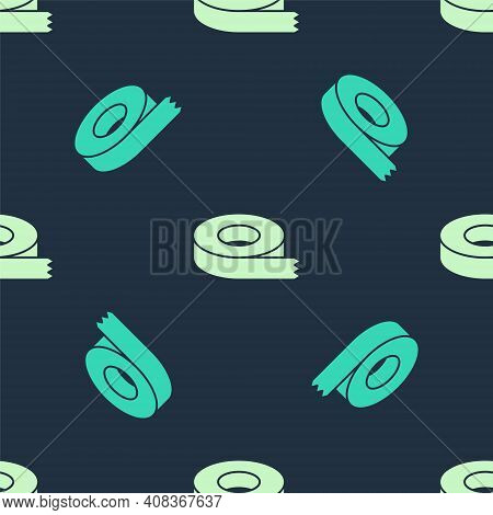 Green And Beige Scotch Tape Icon Isolated Seamless Pattern On Blue Background. Insulating Tape. Vect