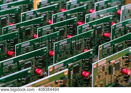 New Produced Automotive Printed Circuit Boards With Soldered Surface Mounted Components.