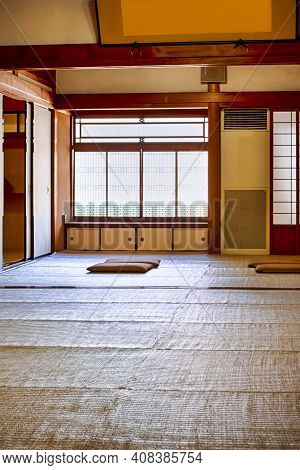 View Of Traditional Japanese Shinto Monastery Dining Room With Floor Mats And Sitting Pillows At Koy