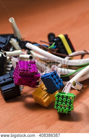 Closeup Of Laboratory Wire Terminals And Service Connector Placed Together.
