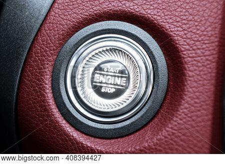Car Dashboard With Focus On Red Engine Start Stop Button. Modern Car Interior Details. Start/stop Bu